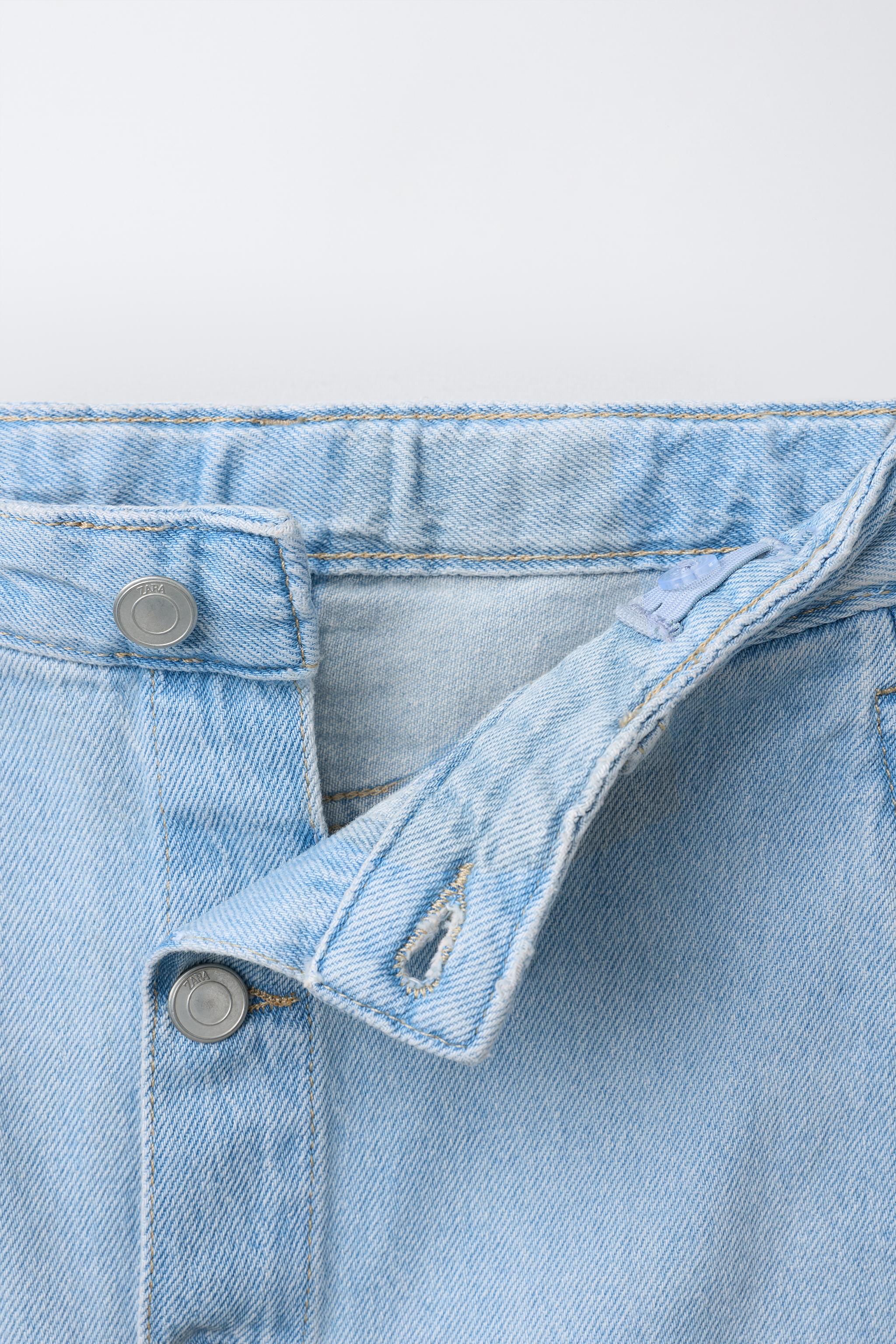 JUPE EN JEAN MI-LONGUE À BOUTONS